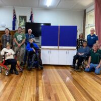 Mens shed donates TV cabinet to Warragul group